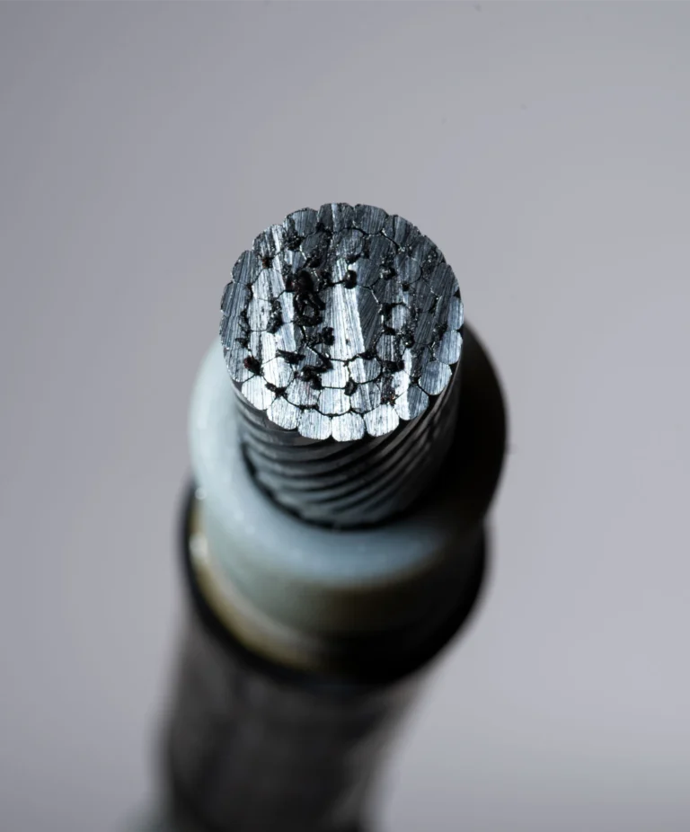 Close-up view of an offshore wind turbine's cable showing intricate wiring for electricity transmission