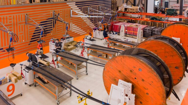 Pre-terminated high-voltage cables laid out on a utility-scale energy storage site for faster BESS grid connection.